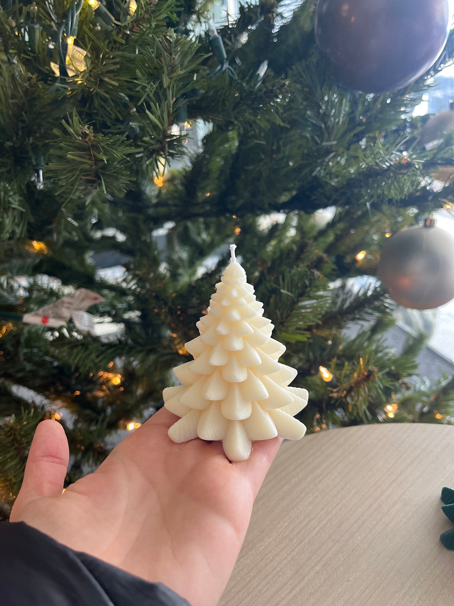Green and white Christmas tree candle