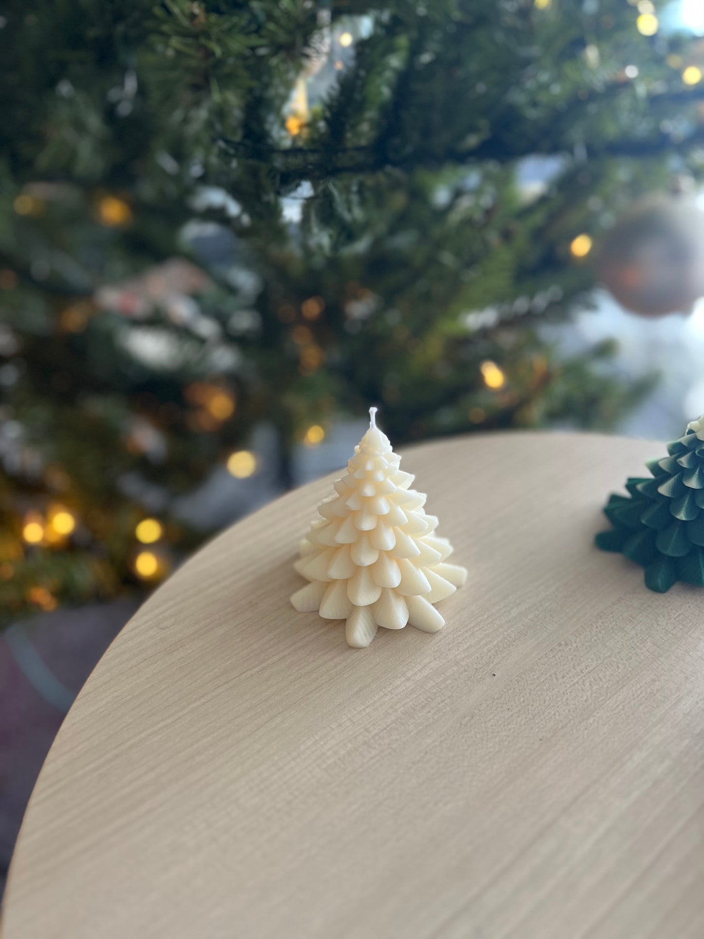 Green and white Christmas tree candle