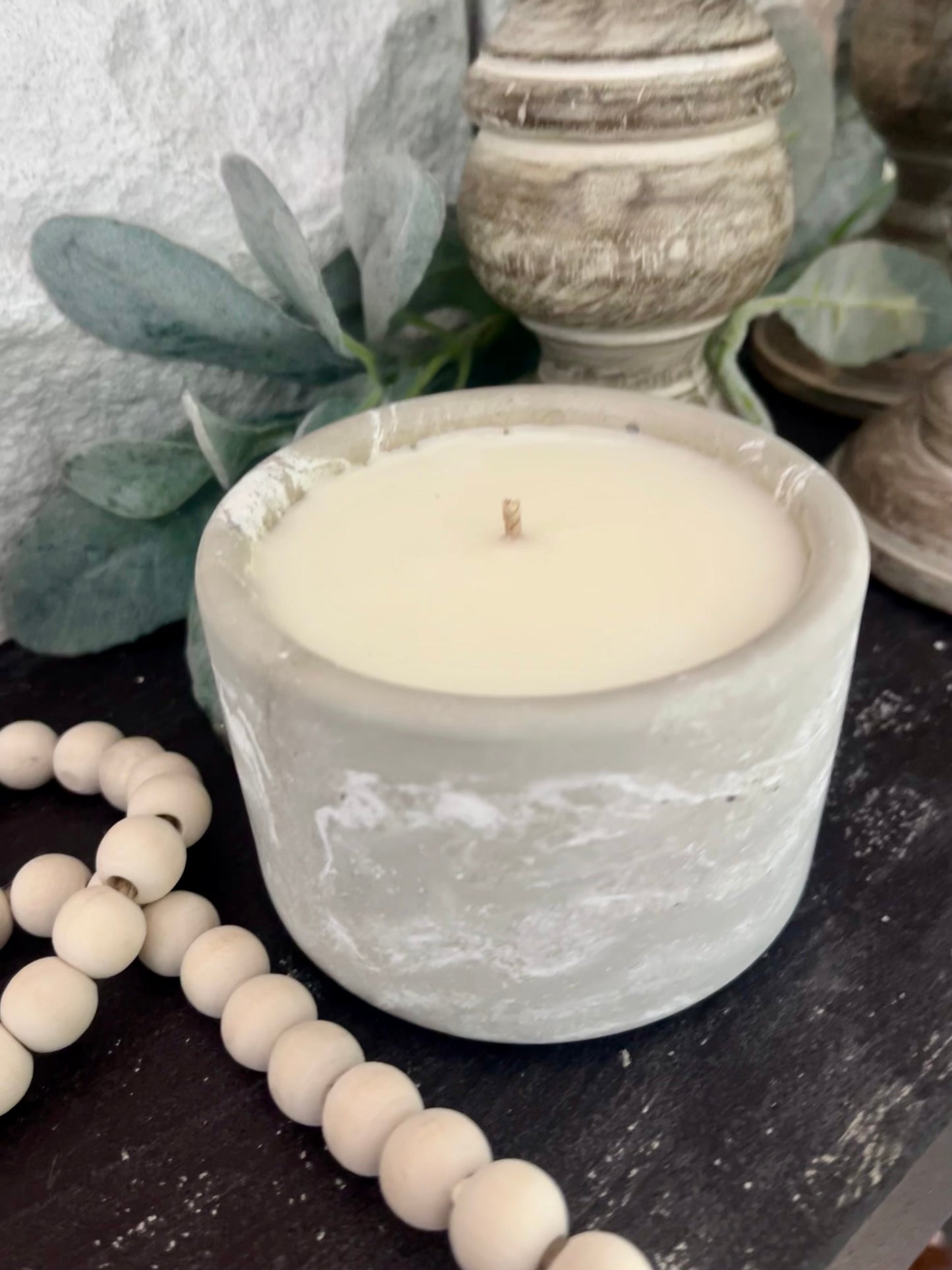 White concrete candle