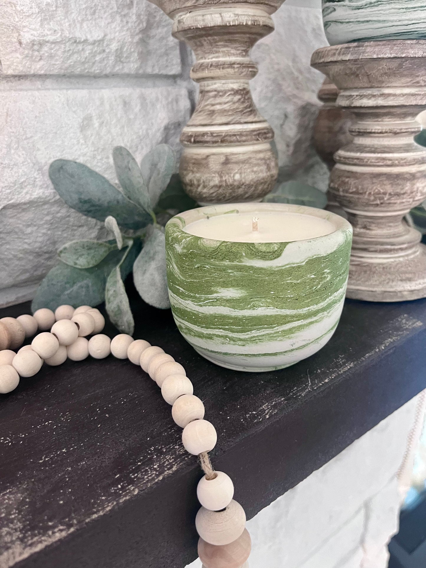 Sage green concrete candle