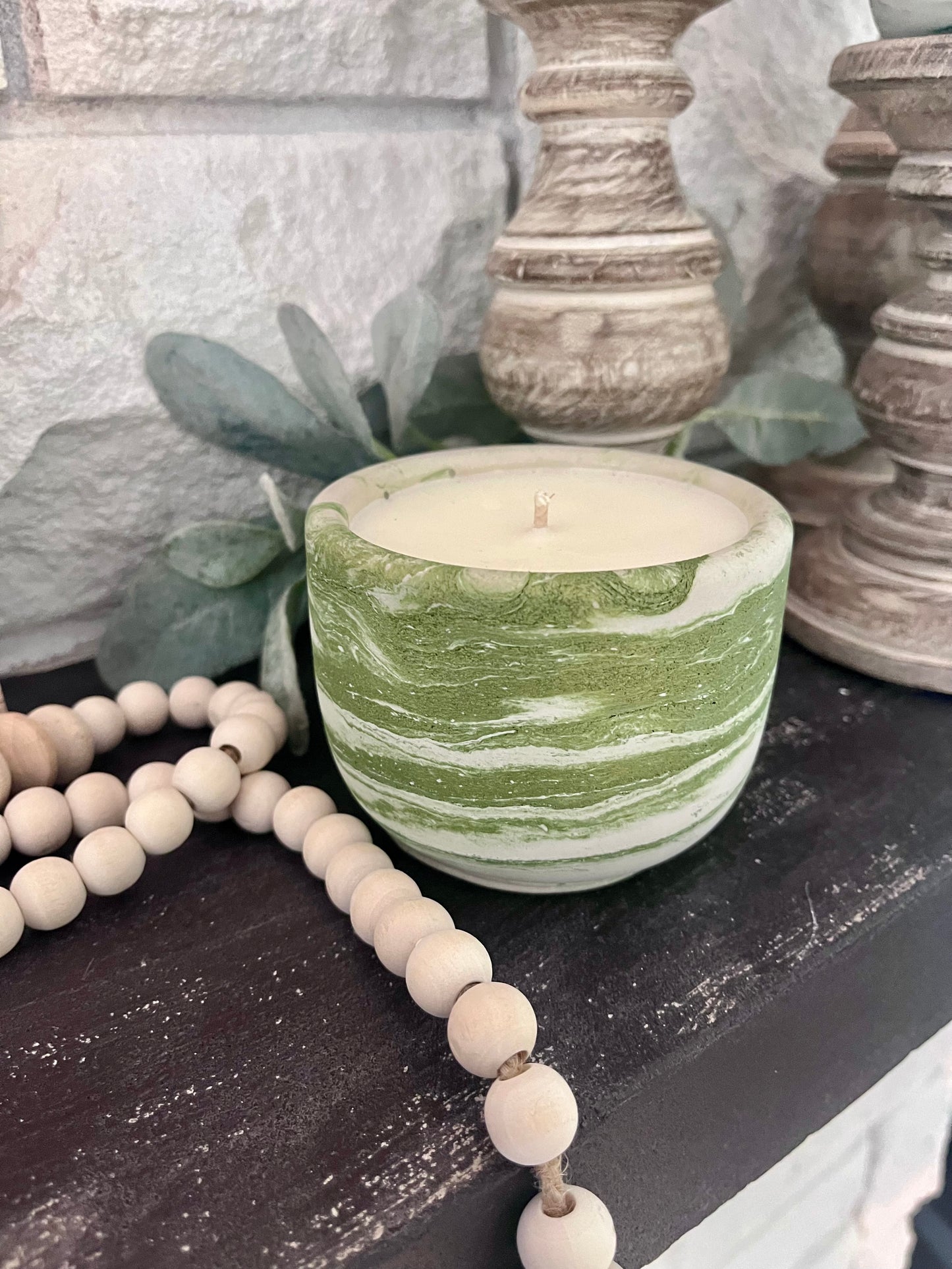 Sage green concrete candle